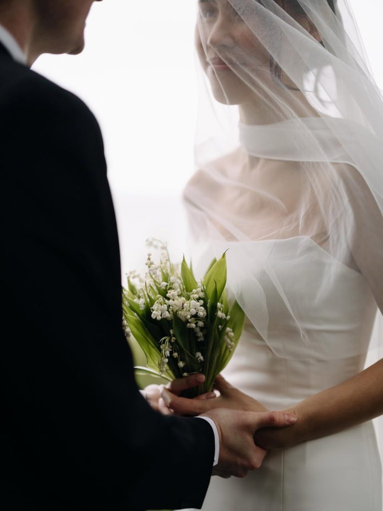 Bride and groom looking at each other during couples portrait session