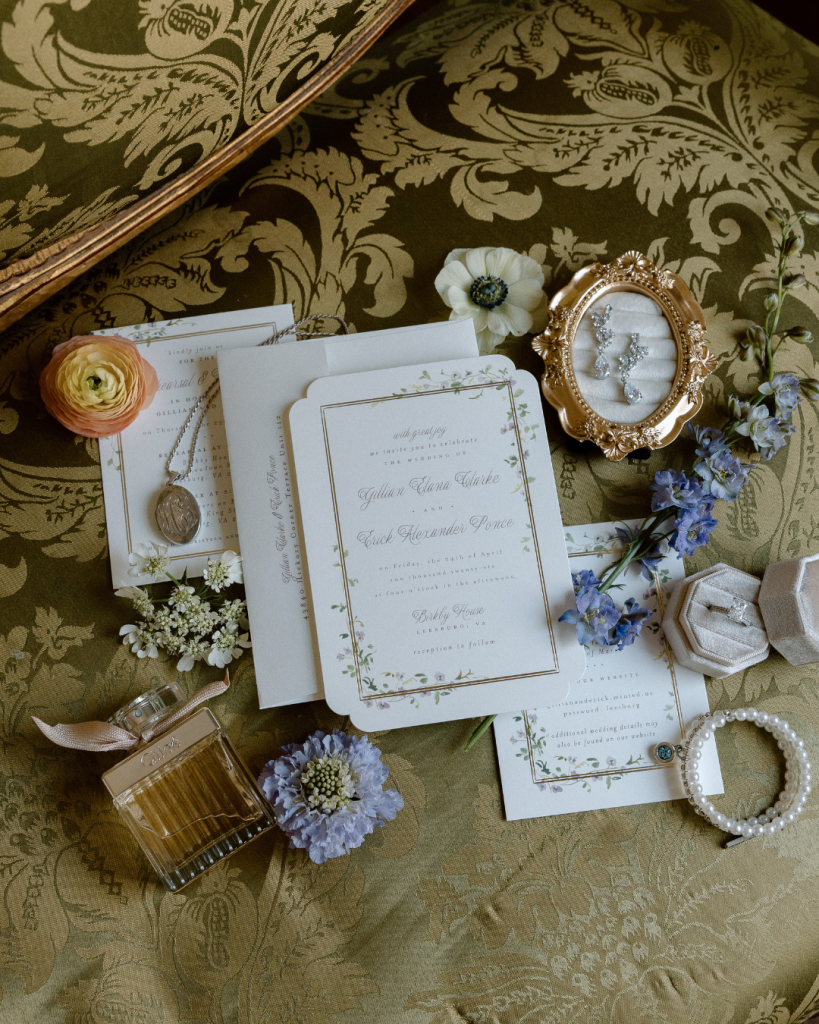 wedding invitation suite with classic and garden style elements including florals and whimsical edges