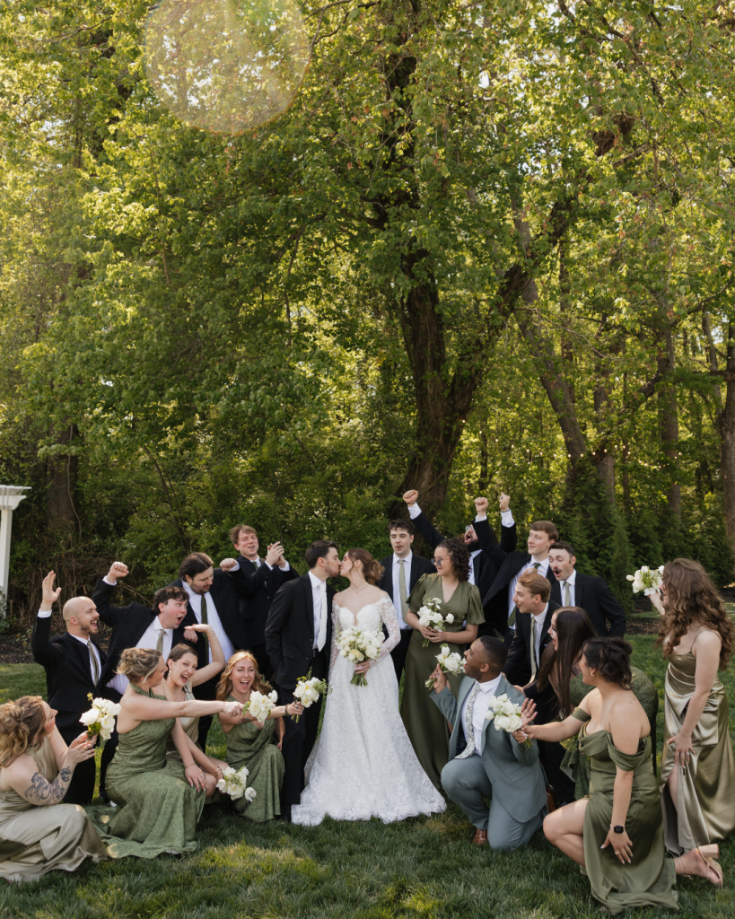 bridal party photography with green and black dresses and suits