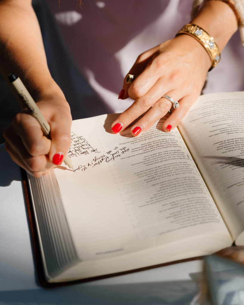 guest signing guest book that is bible