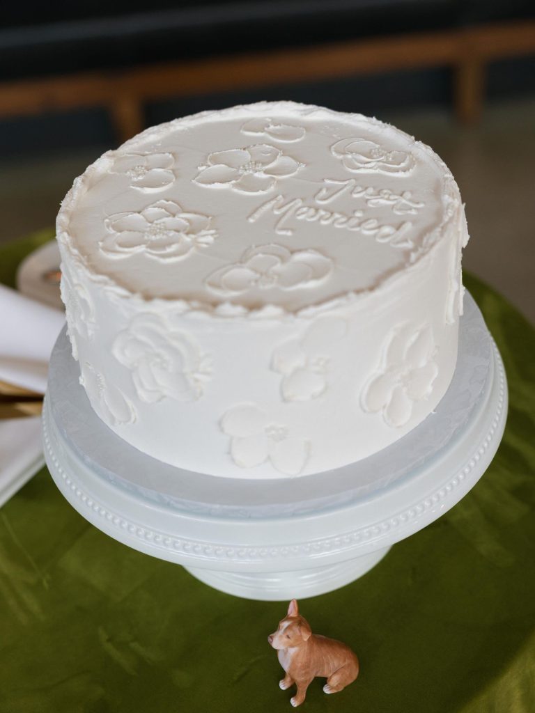 "Just Married" single tier white cake decorated with buttercream florals by 3:14 Cakes.