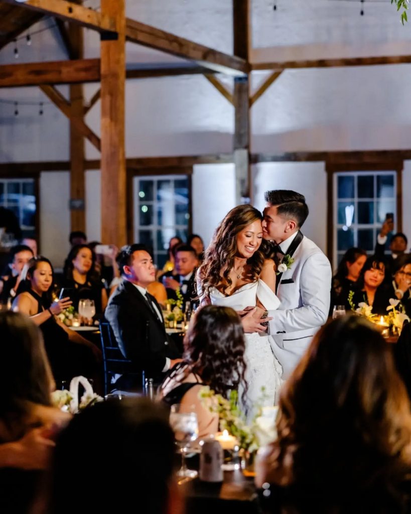 bride and groom sharing first dance together at wedding reception at Great Estate Marsh the stables