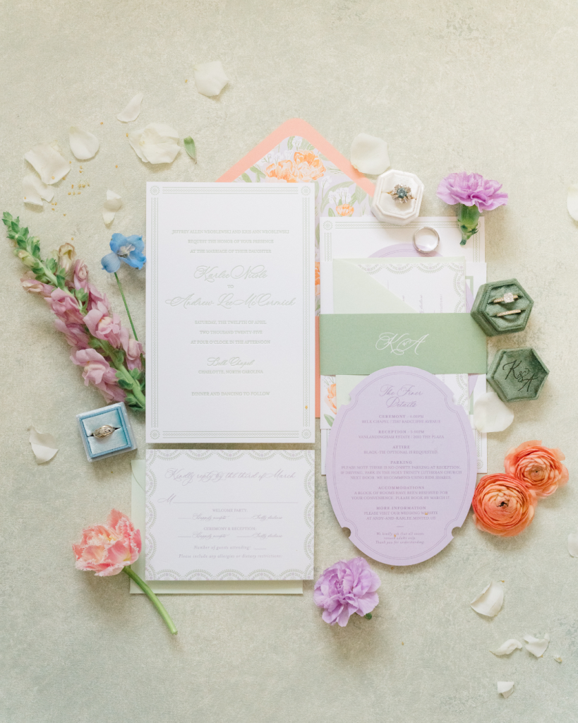 Spring wedding invitation suite featuring pastel colors, floral artwork, and fine stationery details for a Charlotte wedding.