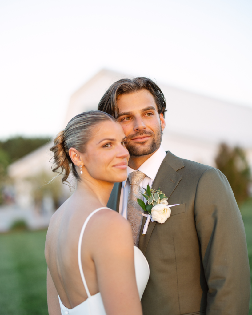 Bride and groom sharing a romantic portrait at sunset during their elegant Eastern Shore wedding celebration.