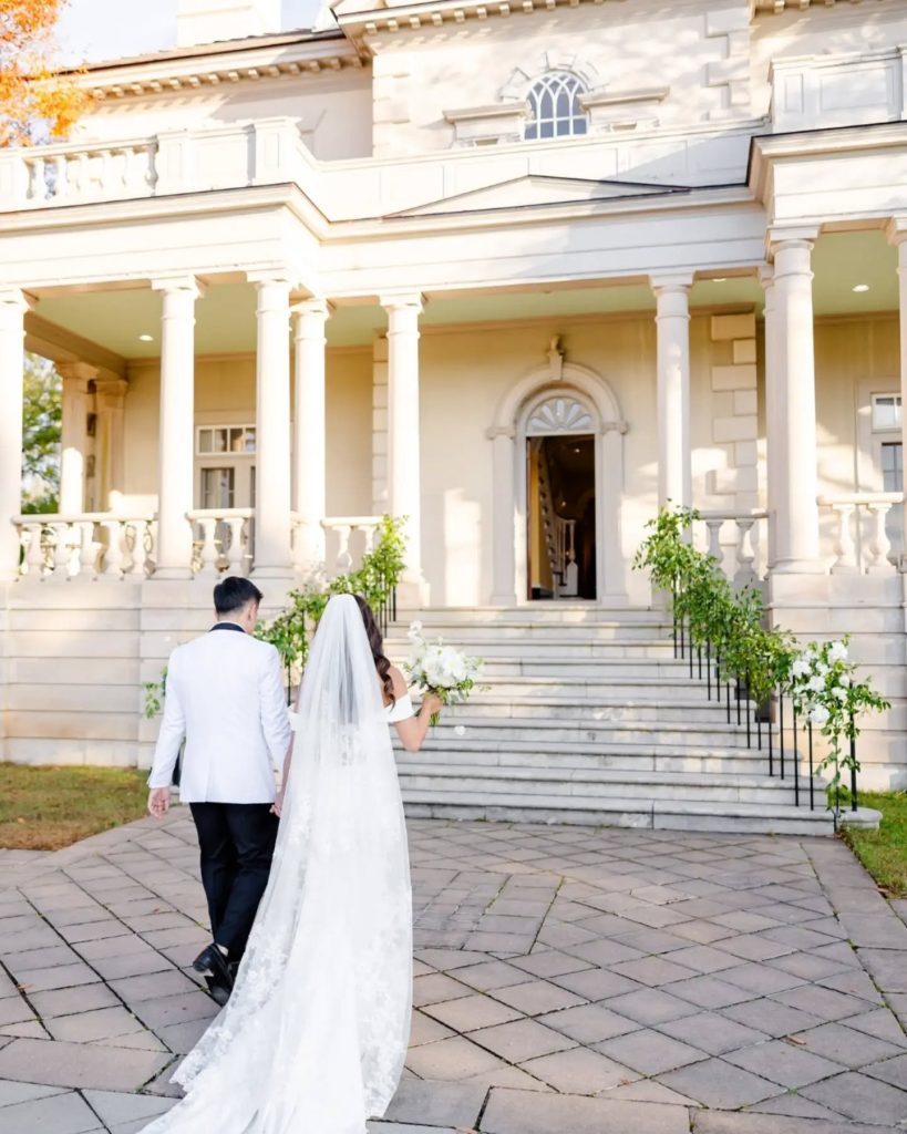 bride and groom walking out of outdoor wedding ceremony as husband and wife in northern virginina wedding venue