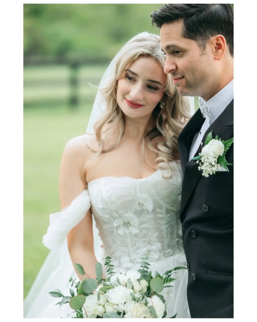 bride and groom soft smiling after wedding ceremony