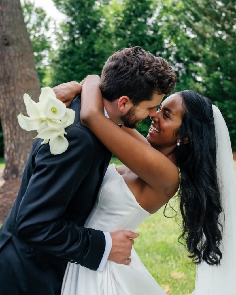 bride and groom kissing after wedding ceremony in NOVA