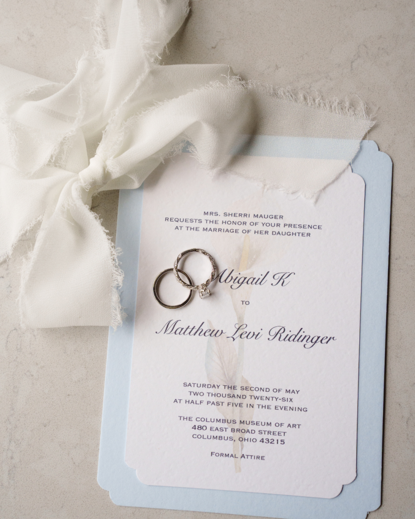 Wedding invitation with blue accents and diamond rings for Columbus Museum of Art wedding