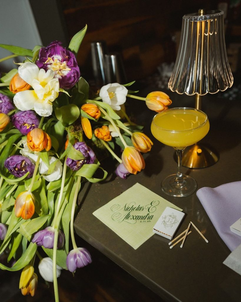 Bright tulips featured in a colorful wedding floral arrangement