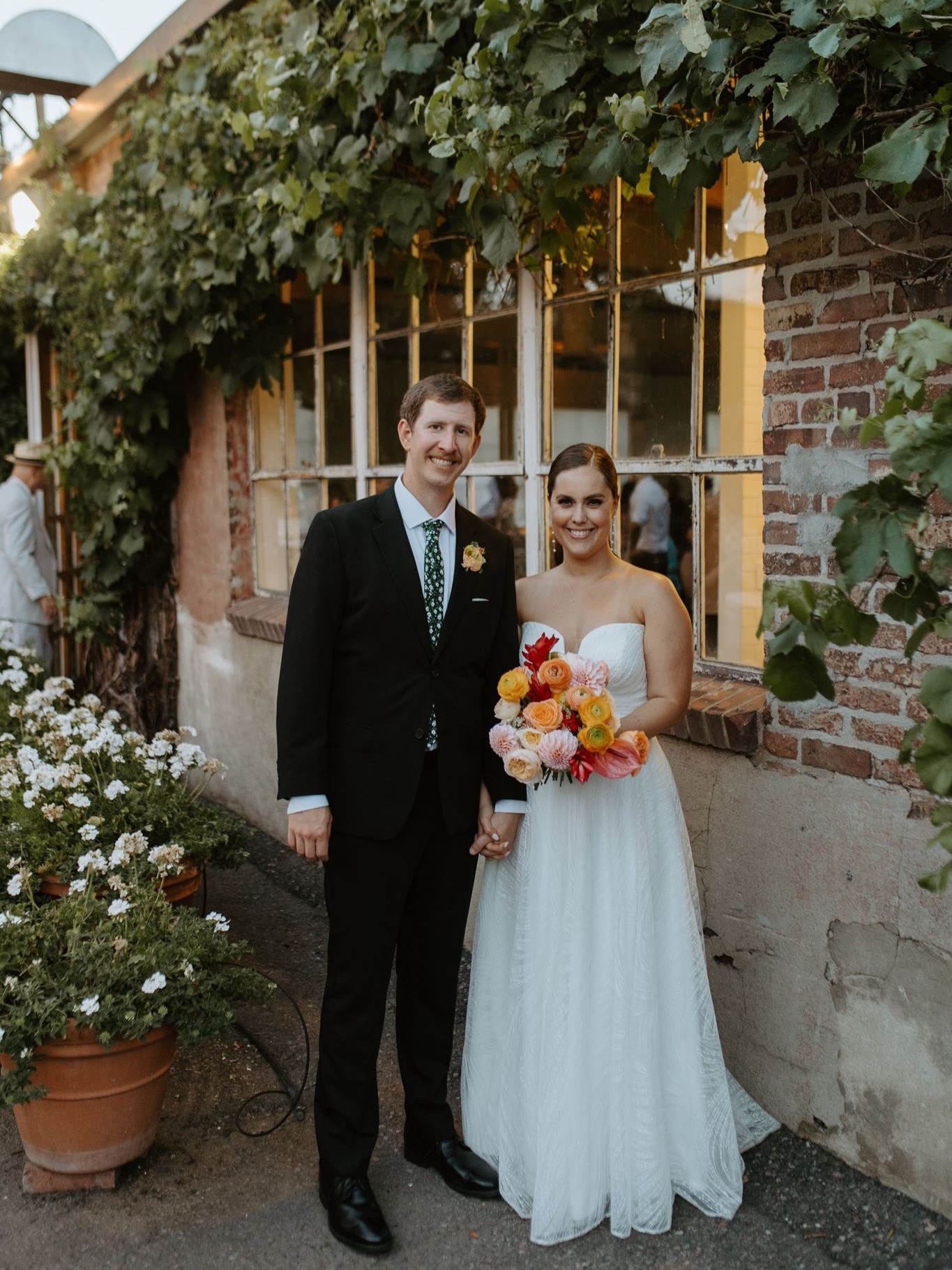 Bride and groom outside of Blanc Denver