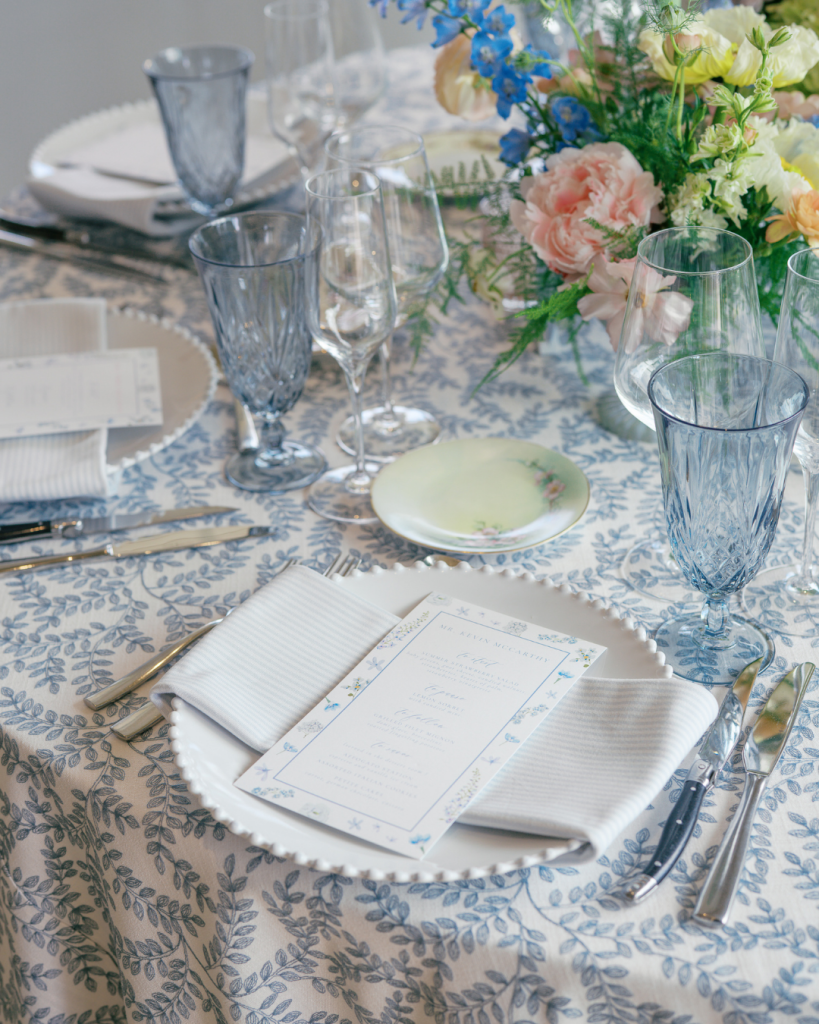 soft blue colored linen table set up for wedding