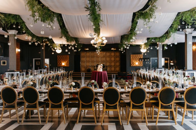 Moody indoor garden party reception planned and designed by The Composed Collective.