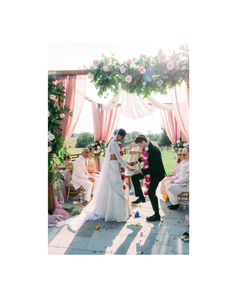 groom breaking glass jewish tradition outside wedding ceremony