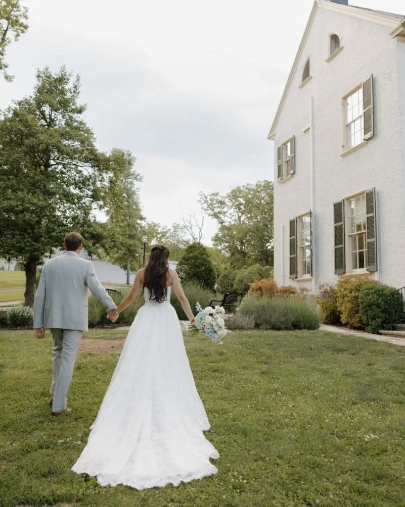 bride and groom outside manor estate virginia