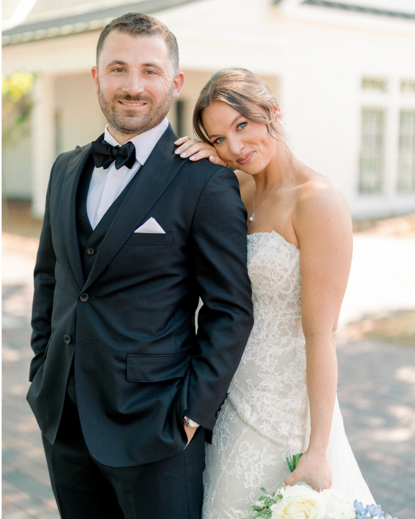 Hannah rests her head on Johnathan’s shoulder during wedding portraits in Mooresville, North Carolina.