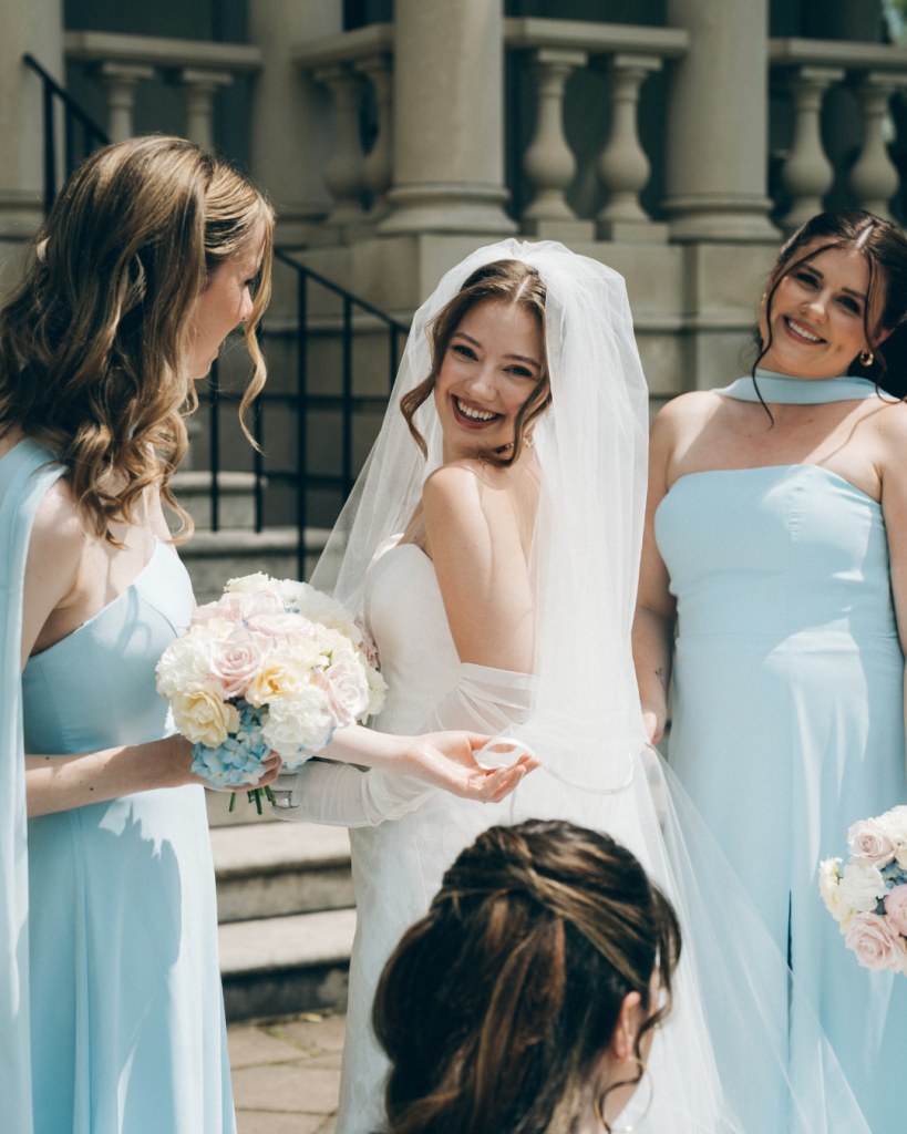 bride with bridesmaids at stairs of estate manor in northern virginia