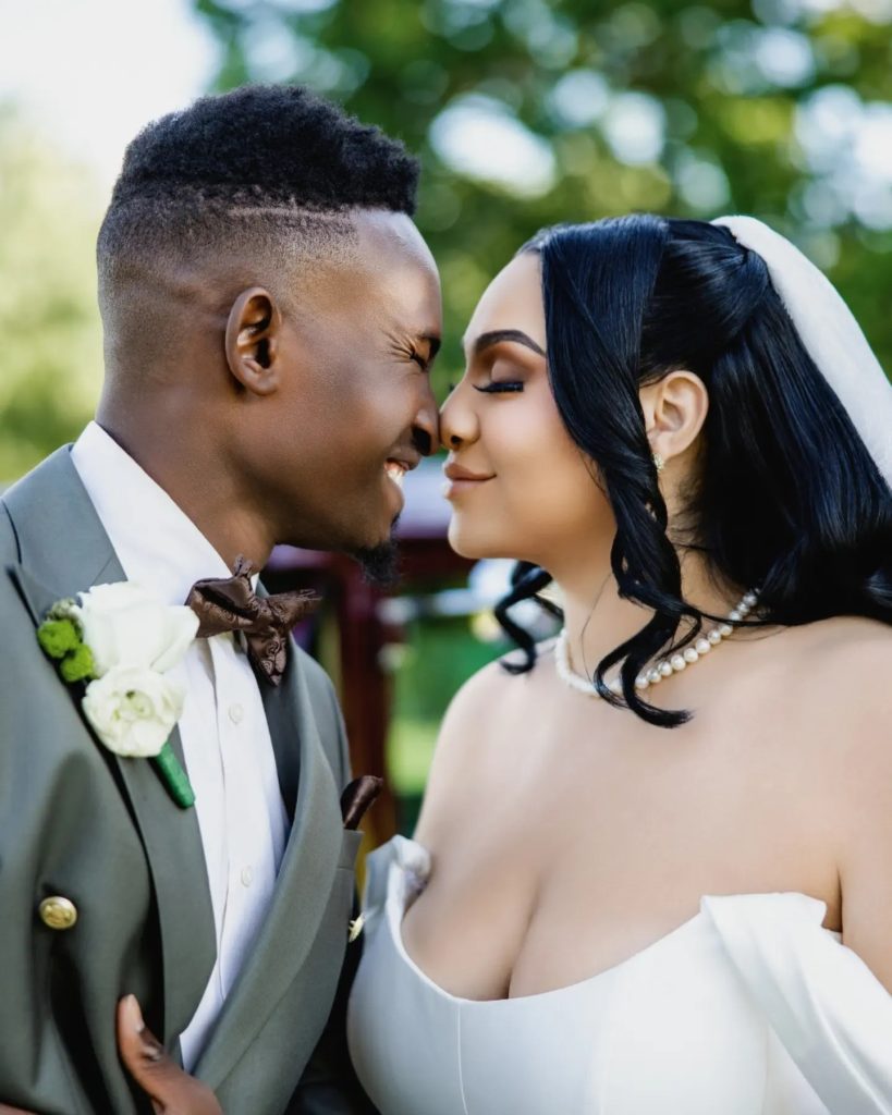 bride and groom during portrait session outdoor wedding ceremony summer wedding