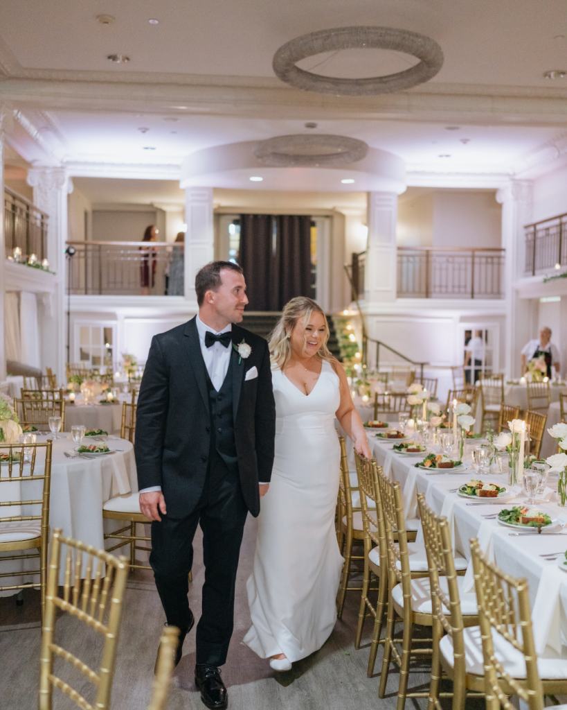 bride and groom reaction to their reception space