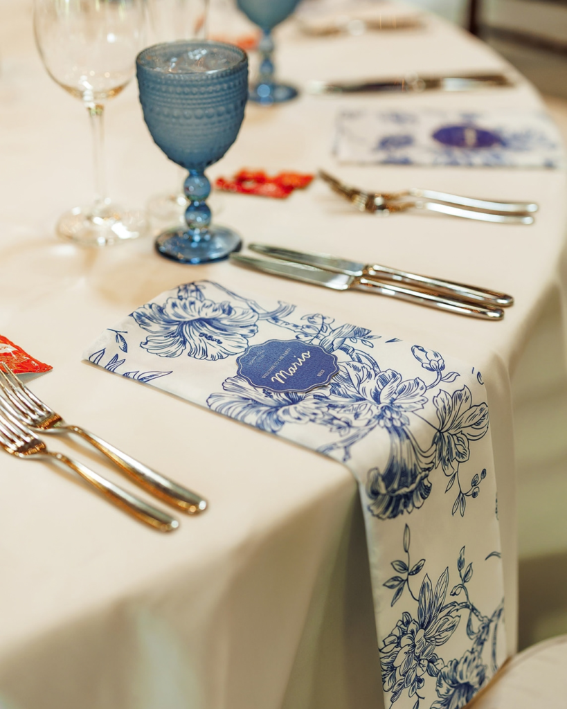 wedding table setting with blue and white accents