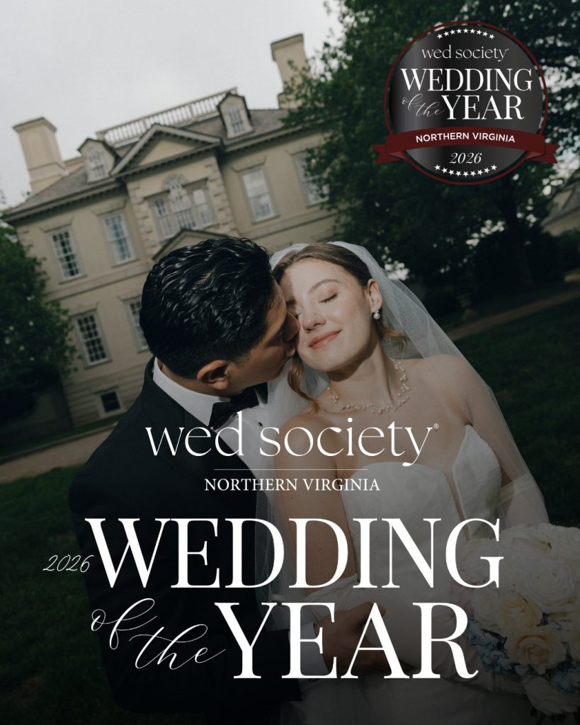 Bride and groom embracing in front of a historic estate under the "Wed Society 2026 Wedding of the Year" feature logo.